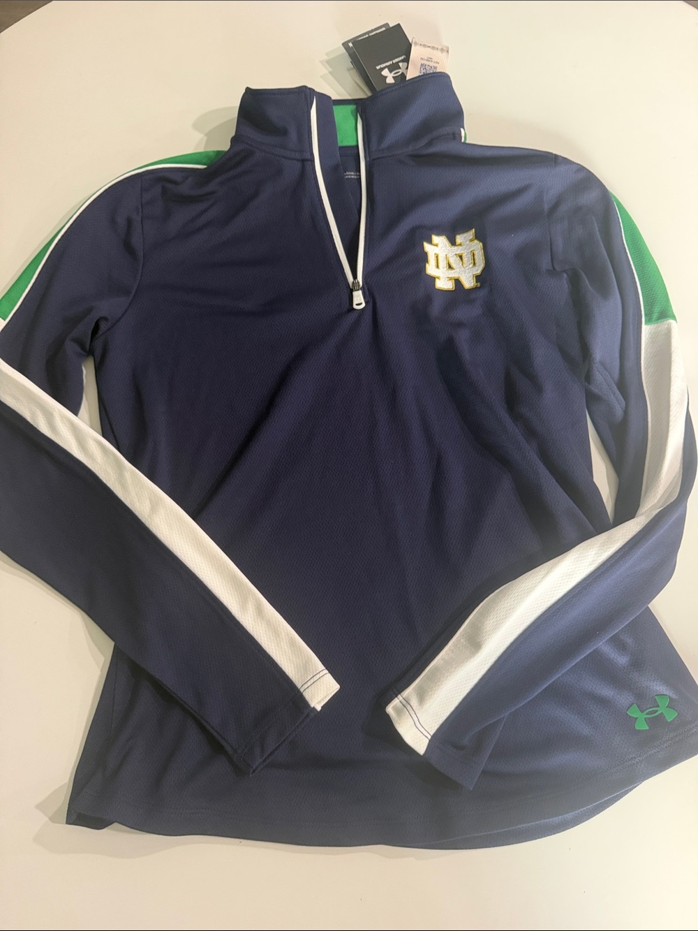 Notre Dame Under Armour Navy Half-Zip with White Sleeve Stripes & Green Logo